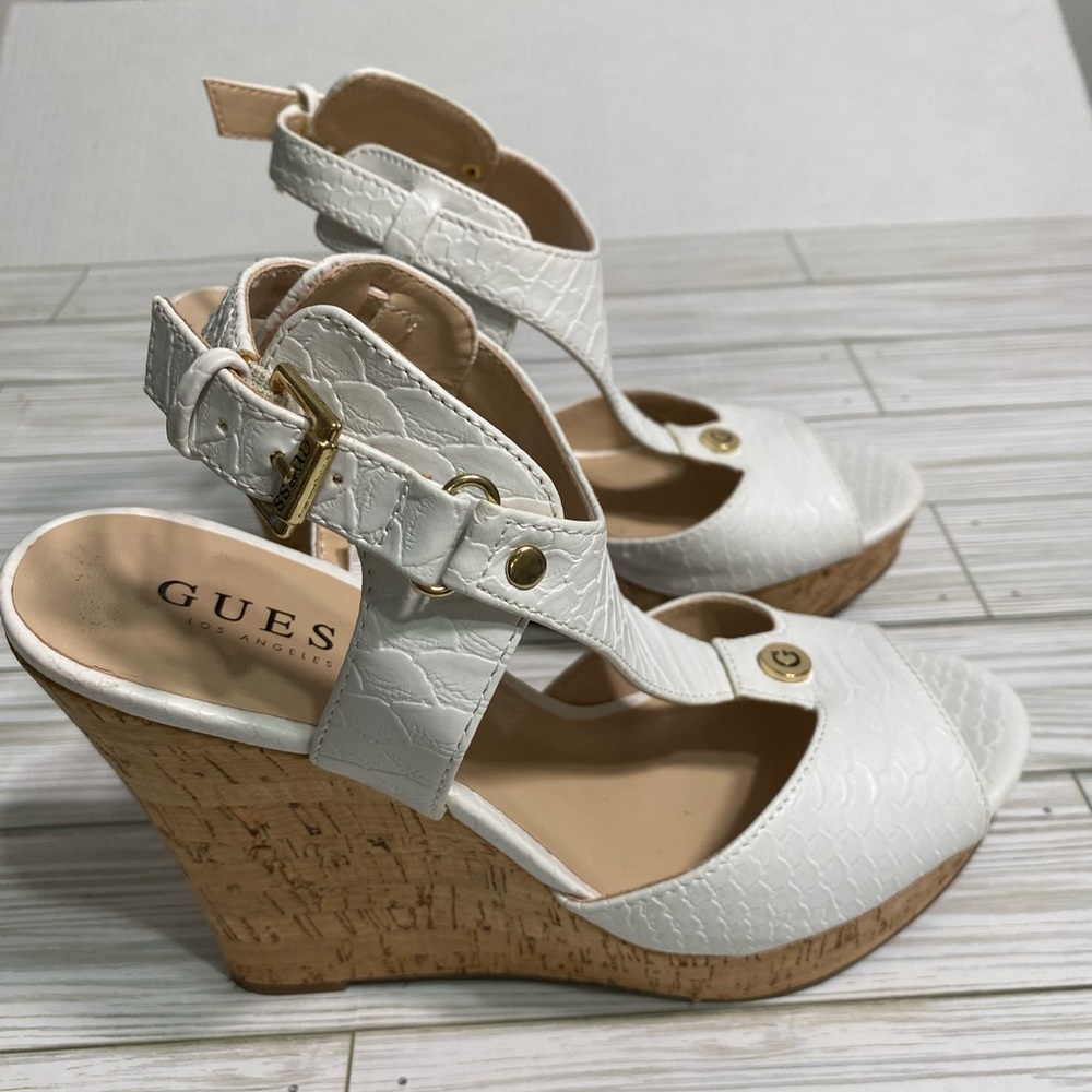 Guess Faux-leather wedge sandal.